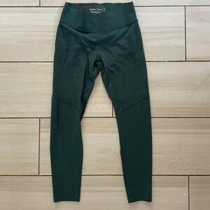 Moss green Outdoor Voices leggings. Back pocket with logo detail. Like new.